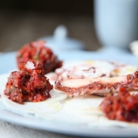 CARPACCIO DI POLPO, CARPACCIO DI DAIKON E PATE' DI POMODORI SECCHI